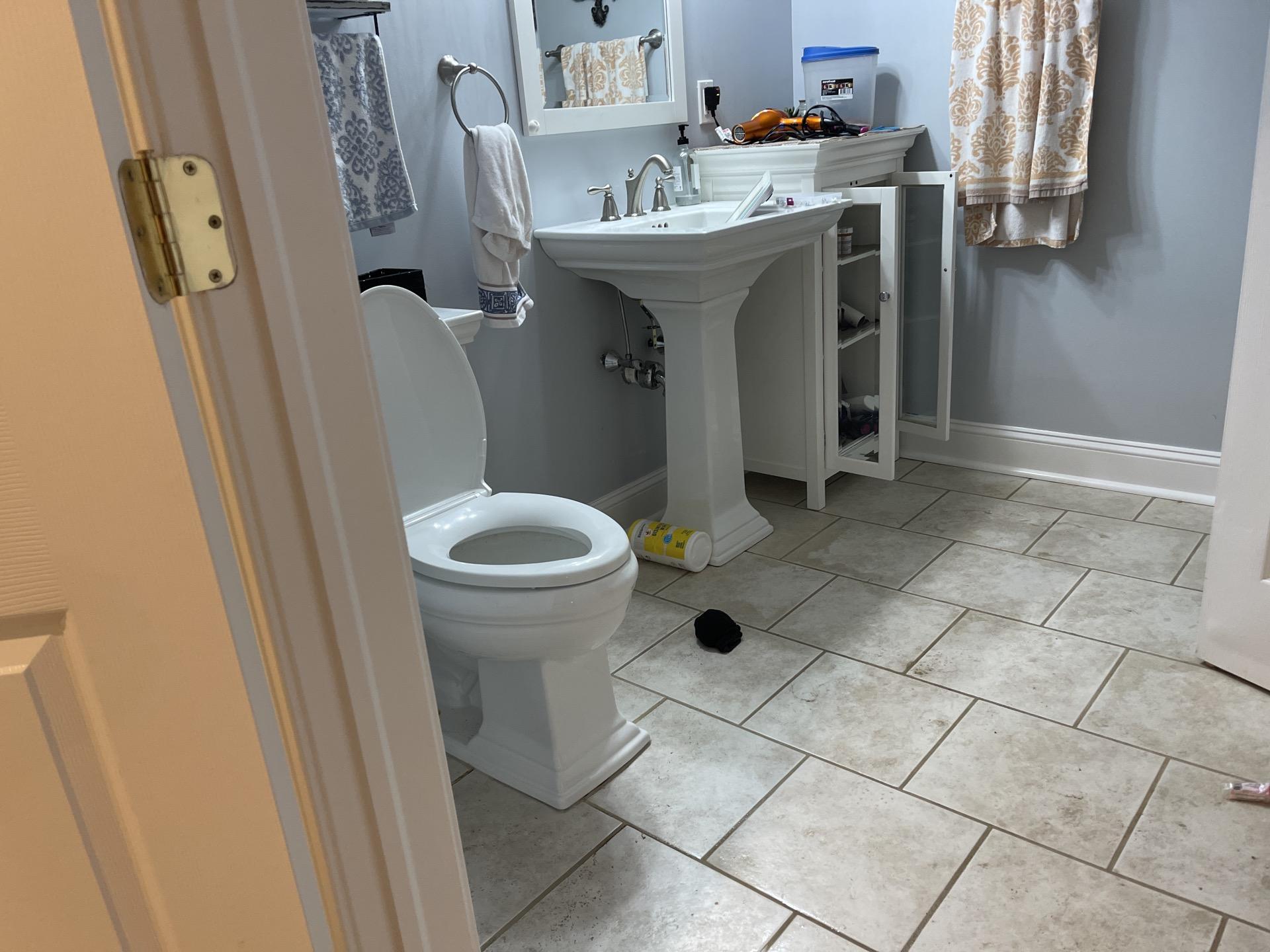 Water leak in upstairs bathroom